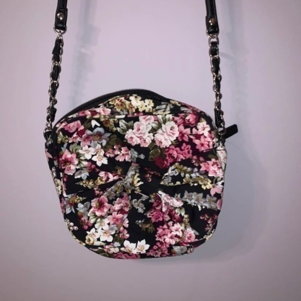 Small floral print black pursue with bow candies